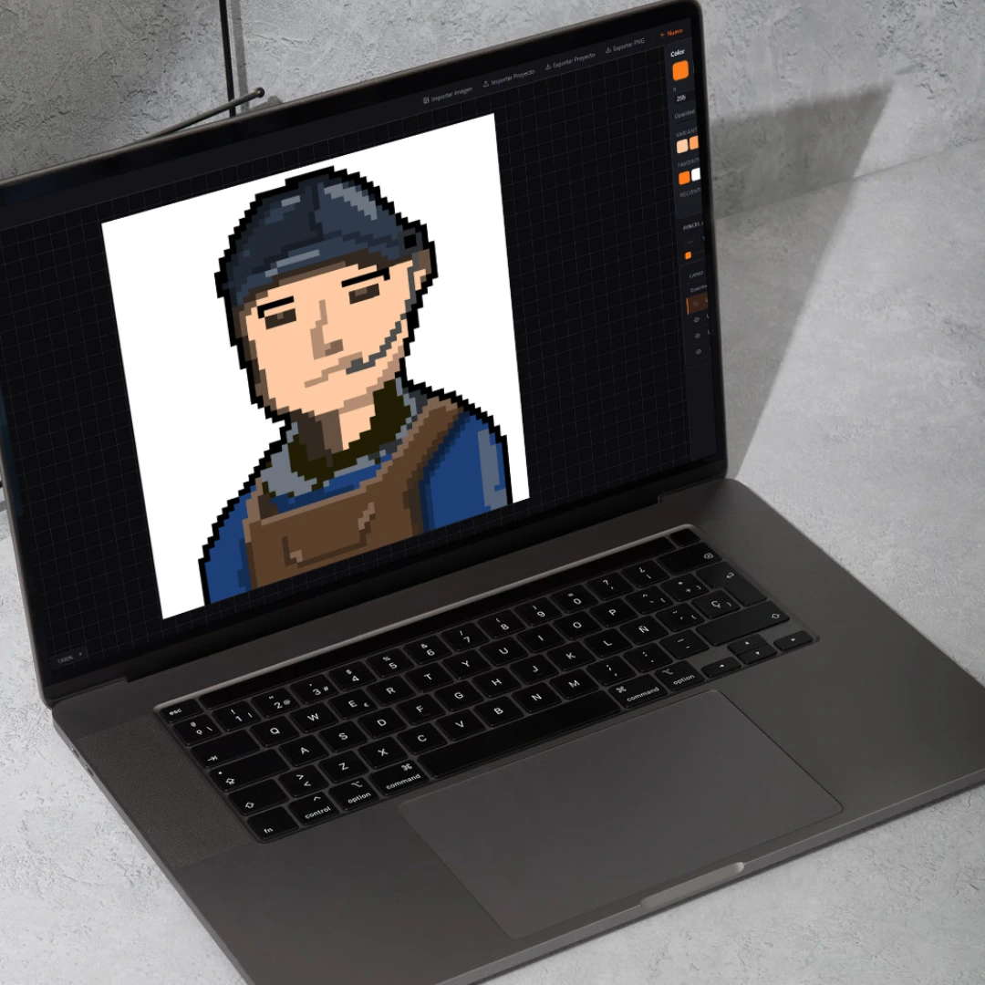 Default Bit mostrado en la pantalla de una notebook sobre una mesa de trabajo.